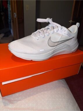 Nike White Trainer with Silver Swoosh